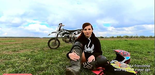  Naked woman riding a Dirt Bike